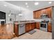 Modern kitchen with stainless steel appliances and granite countertops at 1018 Red Sky Ln. # 101, Murrells Inlet, SC 29576