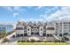 Attractive aerial view of the condo complex shows its proximity to the beach and community parking at 1113 N Ocean Blvd. # 101, Surfside Beach, SC 29575