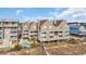 Aerial view of multi-story beachfront condos with swimming pool and walkway to the beach at 1113 N Ocean Blvd. # 101, Surfside Beach, SC 29575