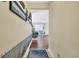 Hallway featuring a view into the dining room and coastal decor at 1113 N Ocean Blvd. # 101, Surfside Beach, SC 29575