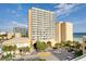 A charming exterior view of a resort building with a stunning beachside view at 1205 S Ocean Blvd. # 20409, Myrtle Beach, SC 29577