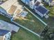 Aerial view of a home with a large, fenced backyard and patio in a residential neighborhood at 1256 Fiddlehead Way, Myrtle Beach, SC 29579