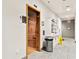 Well-maintained sauna room with a glass door, tiled floors, a trash bin and fresh towels, ideal for relaxation at 180 Rothbury Circle # 302, Myrtle Beach, SC 29572
