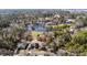 Aerial view of the home nestled among trees, near a pond and golf course for outdoor enjoyment at 1820 Spinnaker Dr., North Myrtle Beach, SC 29582