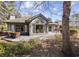 A well-maintained backyard featuring a deck with outdoor dining area at 1820 Spinnaker Dr., North Myrtle Beach, SC 29582