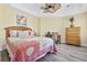 Inviting bedroom with a ceiling fan, a study desk, and coastal decor at 1820 Spinnaker Dr., North Myrtle Beach, SC 29582
