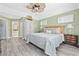 Inviting bedroom with a bed, nautical decor, and open doorway to the en suite at 1820 Spinnaker Dr., North Myrtle Beach, SC 29582