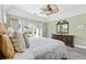 Bright bedroom with a large bed, outdoor view, and lots of natural light at 1820 Spinnaker Dr., North Myrtle Beach, SC 29582
