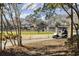Scenic golf course with players, golf cart, and well-manicured greens at 1820 Spinnaker Dr., North Myrtle Beach, SC 29582