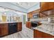 Updated kitchen with stainless steel appliances, granite countertops, and ample cabinet space at 1820 Spinnaker Dr., North Myrtle Beach, SC 29582