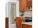 Kitchen featuring stainless steel appliances, granite countertops, and custom cabinetry at 1820 Spinnaker Dr., North Myrtle Beach, SC 29582