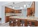 Eat-in kitchen showcases wood cabinetry, granite countertops, stainless steel appliances, and hardwood floors at 1820 Spinnaker Dr., North Myrtle Beach, SC 29582