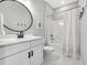 Modern bathroom with white vanity, sleek fixtures, and a shower-tub combination at 186 Cayman Loop, Pawleys Island, SC 29585