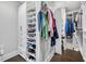 This walk-in closet has custom shelving that is ideal for storing all types of clothing and personal items at 186 Cayman Loop, Pawleys Island, SC 29585