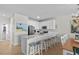 Bright, open-concept kitchen with stainless steel appliances and breakfast bar at 2000 N Waccamaw Dr., Garden City Beach, SC 29576