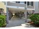 View of the home's support structure showing the space for parking and outdoor storage at 2000 N Waccamaw Dr., Garden City Beach, SC 29576