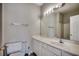 Well-lit bathroom features a white vanity, large mirror, and a shower-tub combo at 2005 Silvercrest Dr. # 32-B, Myrtle Beach, SC 29579