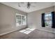 Neutral bedroom with carpet and two windows at 2005 Silvercrest Dr. # 32-B, Myrtle Beach, SC 29579