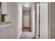 Inviting hallway with neutral colors, tiled entry, and carpeted flooring at 2005 Silvercrest Dr. # 32-B, Myrtle Beach, SC 29579