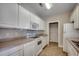Clean kitchen featuring white appliances and ample counter space at 2005 Silvercrest Dr. # 32-B, Myrtle Beach, SC 29579