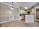 Bright kitchen with tiled floor and white cabinets at 2005 Silvercrest Dr. # 32-B, Myrtle Beach, SC 29579