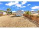 Fenced backyard featuring a storage shed, offering a secure space for storage and outdoor activities at 206 Balsa Dr., Longs, SC 29568