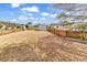 Spacious backyard featuring a storage shed and wooden fence, great for outdoor enjoyment and activities at 206 Balsa Dr., Longs, SC 29568
