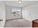 Bedroom with a bright window and neutral carpet at 206 Balsa Dr., Longs, SC 29568