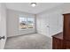 Bedroom with a bright window and neutral carpet at 206 Balsa Dr., Longs, SC 29568