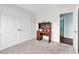 Bedroom with closet doors and neutral carpet at 206 Balsa Dr., Longs, SC 29568