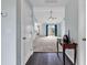 Inviting entryway featuring dark wood floors that open into a spacious living area at 206 Balsa Dr., Longs, SC 29568