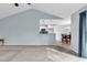 Bright and airy living room showing a view of the kitchen and dining area at 206 Balsa Dr., Longs, SC 29568