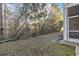 Expansive backyard featuring mature trees, perfect for outdoor activities and privacy at 210 Portsmith Dr. # 2, Myrtle Beach, SC 29588