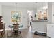 Dining area view shows modern lighting and accents, as well as the open floor plan to the kitchen at 210 Portsmith Dr. # 2, Myrtle Beach, SC 29588