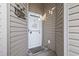 Charming front door with welcome sign and decorative accents, creating a warm entry at 210 Portsmith Dr. # 2, Myrtle Beach, SC 29588