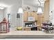 Bright kitchen area with pendant lighting, full appliances, and ample cabinet storage space at 210 Portsmith Dr. # 2, Myrtle Beach, SC 29588