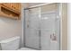 Bathroom showing a glass-door shower over tub and a toilet at 2288 Beauclair Ct., Myrtle Beach, SC 29579