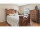 Bedroom with a large bed, dresser, and window at 2288 Beauclair Ct., Myrtle Beach, SC 29579
