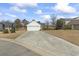 Charming single-story home featuring a long driveway leading to a two-car garage in a sunny setting at 2288 Beauclair Ct., Myrtle Beach, SC 29579