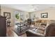 Bright living room with hardwood floors, neutral walls, and sliding doors that lead to the outside at 2288 Beauclair Ct., Myrtle Beach, SC 29579