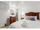 Bright bedroom featuring a cozy queen bed, ensuite bathroom and modern coastal decor at 2600 S Ocean Blvd. # 101, Myrtle Beach, SC 29577