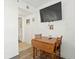 Efficient kitchenette layout with TV for cozy dining and entertainment at 2600 S Ocean Blvd. # 101, Myrtle Beach, SC 29577