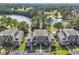 Beautiful condo complex with manicured landscaping, golf course and a large pond in a scenic setting at 298 Pinehurst Ln. # 10-J, Pawleys Island, SC 29585