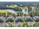 Aerial view of condo community near golf course and lake, offering scenic beauty at 298 Pinehurst Ln. # 10-J, Pawleys Island, SC 29585