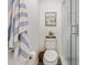 Well-appointed bathroom with a glass-enclosed shower, modern fixtures, and fresh decor that combine style with functionality at 298 Pinehurst Ln. # 10-J, Pawleys Island, SC 29585