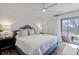 Serene main bedroom with access to a private balcony, creating a peaceful retreat with calming views at 298 Pinehurst Ln. # 10-J, Pawleys Island, SC 29585