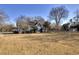 Expansive backyard with a well-maintained lawn and privacy fence at 309 W Bond St., Marion, SC 29571