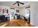 Bedroom featuring hardwood floors, a ceiling fan, and natural light at 309 W Bond St., Marion, SC 29571
