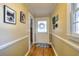 Hallway with hardwood floors and decorative wall accents at 309 W Bond St., Marion, SC 29571