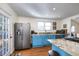 Updated kitchen with stainless steel appliances and center island at 309 W Bond St., Marion, SC 29571